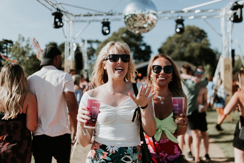 Festival Goers with printed cups